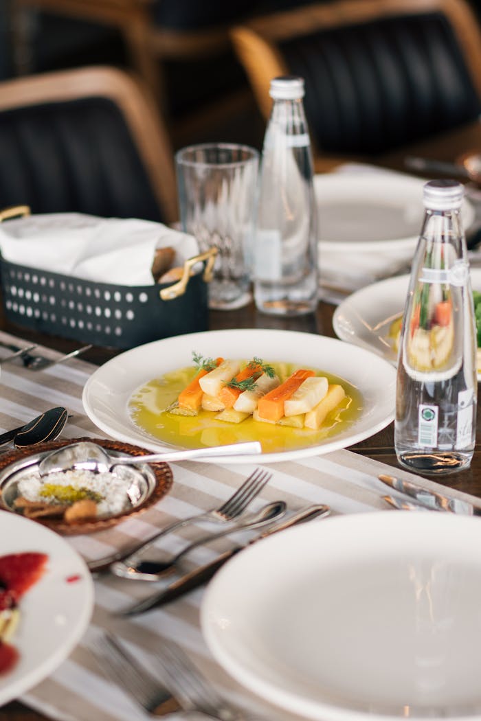 A sophisticated dining setup featuring a plated appetizer at a restaurant in İstanbul, Türkiye.