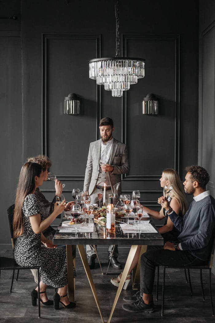 A sophisticated wine tasting experience with diverse adults in a stylish restaurant setting.